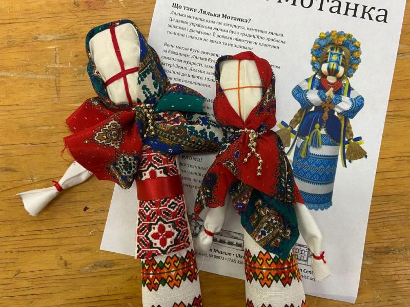 Two colorful wrapped dolls.