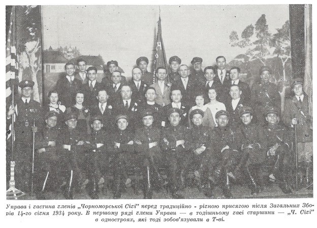 Membership of the Chornomorska Sitch in 1934 Caption translation: "Board and a portion of the membership of the 'Chornomorska Sitch' before its traditional annual oath after its general meeting on Jan. 14, 1934. In the first row are members of the board -- then known as officers -- of the 'Chornomorska Sitch' in the uniforms that were then required by the Society."