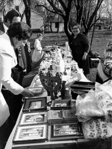 Vendor on the grounds of St. Andrew Memorial Church during "Provody"